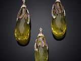 a set of three yellow quartz and pink tourmaline pendants