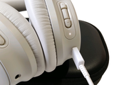 a pair of headphones sitting on top of a black case