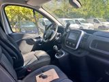 the interior of a car with a steering wheel and dashboard controls