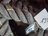 a close up of a rope with a tag on it