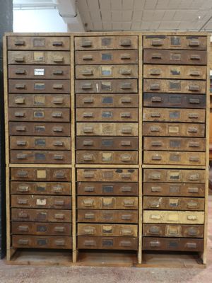 a lot of drawers that are stacked on top of each other