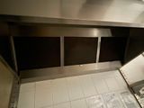 a view of a kitchen with a sink and a stove
