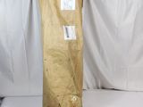 a large brown bag that is sitting on a white surface