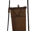 a wooden bucket with a wooden spear and a wooden bucket with a wooden handle