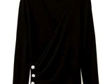 black long sleeved top with buttons on the front