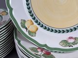 a lot of plates that are stacked on top of each other