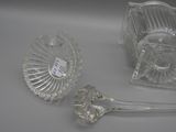 two glass items that are sitting on a table