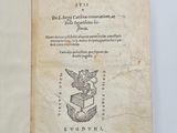 an open book with a drawing of a bird on it