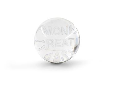silver plated coin with the words money, meat, and cash written on it