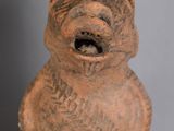 statue of a bear with open mouth on a gray background