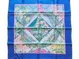 a blue and pink square scarf with a floral design