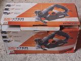 boxed box of power tools sitting on the floor on the floor