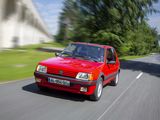 a red car that is driving down the road