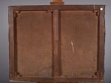 an old wooden easel with a piece of canvas on it