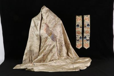 an image of a cloth and a tie are on a black background