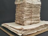 a stack of old books sitting on top of each other