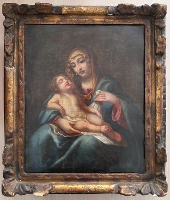 une peinture ancienne représentant une femme tenant un enfant dans ses bras