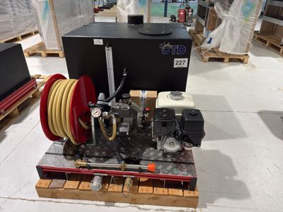 a machine that is sitting on a pallet in a warehouse
