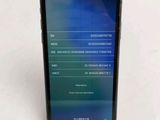 the back of a black phone with a screen showing the settings of the phone