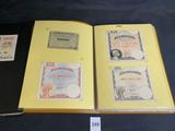 an open book with a lot of different stamps on it