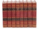 un coffret de cinq livres à couverture rouge et bordures dorées