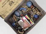a box full of assorted items sitting on a table