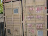 a large container sitting on the side of the road