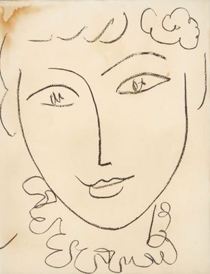 l'image d'un dessin du visage d'une femme sur un morceau de papier