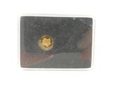 a picture of a black and gold business card case