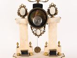 a clock that is sitting on top of a table