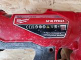 the milwaukee milwaukee m18 fuel gun is laying on the floor