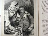 an open book with a drawing of a man and a woman sitting at a table