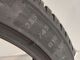 a close up of a tire on a white surface