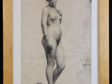 an old black and white photo of a woman standing in front of a wall