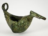 an image of a green vase with a handle on a white surface