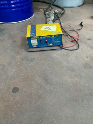 a blue barrel and a yellow box on the floor