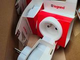 a cardboard box with a white tape and a red box with a white tape on it