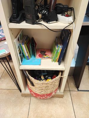 a book shelf with a bunch of books on it