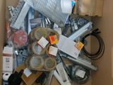 a cardboard box filled with assorted items in it