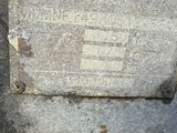 a cement block with a sign on it