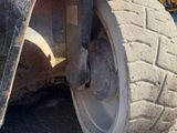 a close up of a wheel on a construction vehicle