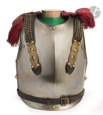une image représentant un casque surmonté d'un pompon rouge