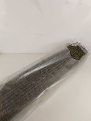 a bag of seeds and a knife on a table