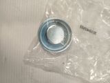 a plastic bag with a small metal object inside of it