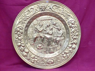 an old silver plate with a man and woman on it