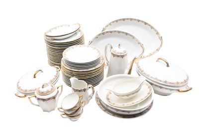 many plates and cups and saucers on the table