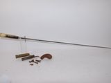 a picture of a knife and other items on a white surface