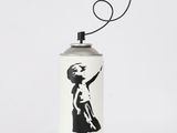 graffiti spray can with a red balloon floating in the air