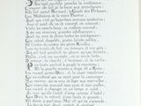 an old book with a black and white picture on it