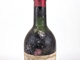 a bottle of wine that is sitting on a table